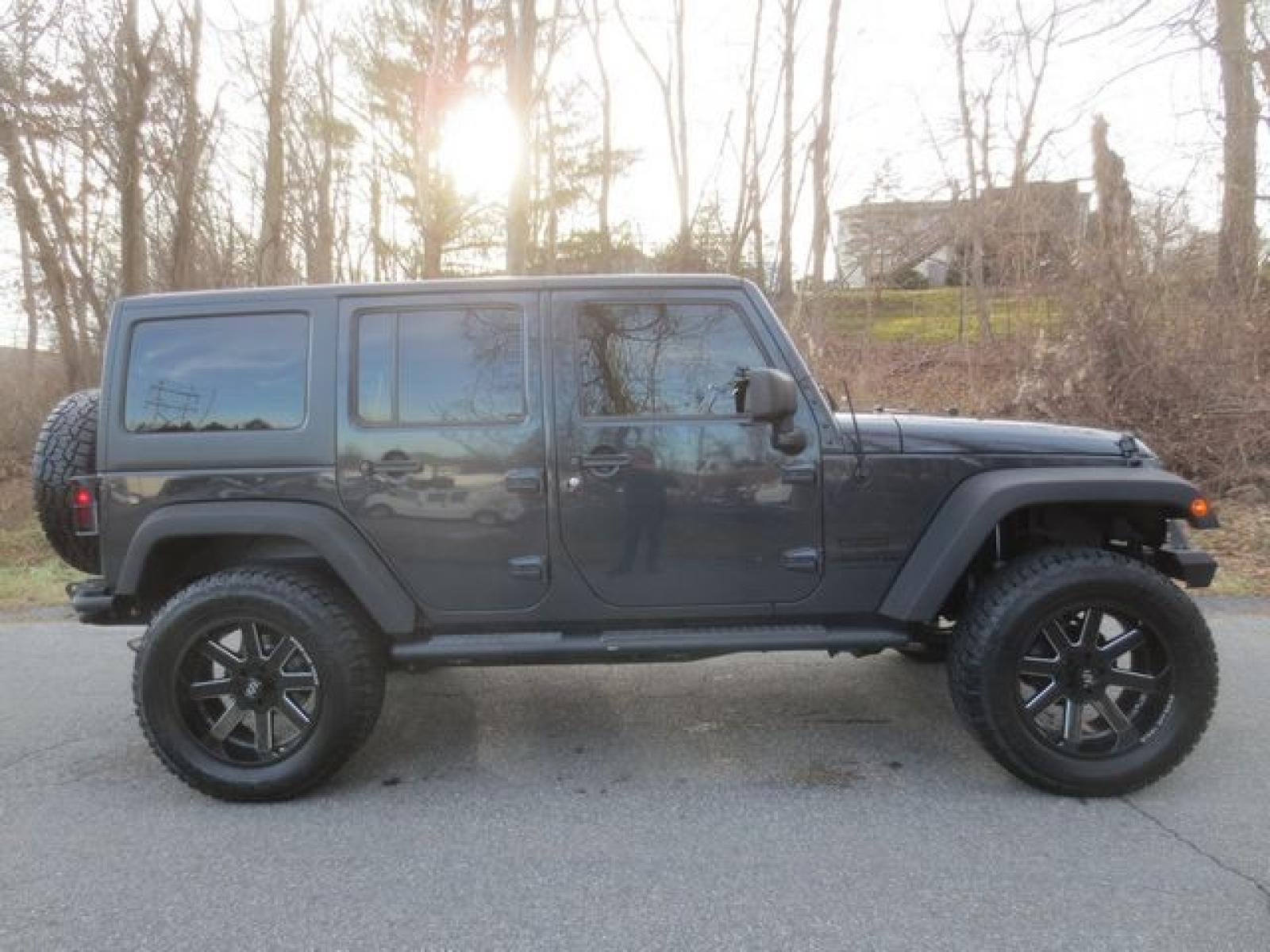 2016 Gray /Black Jeep Wrangler Unlimited Sport (1C4BJWDG6GL) with an 3.6 L v6 engine, 6 Speed Manual transmission, located at 270 US Route 6, Mahopac, NY, 10541, (845) 621-0895, 41.349022, -73.755280 - Photo #11